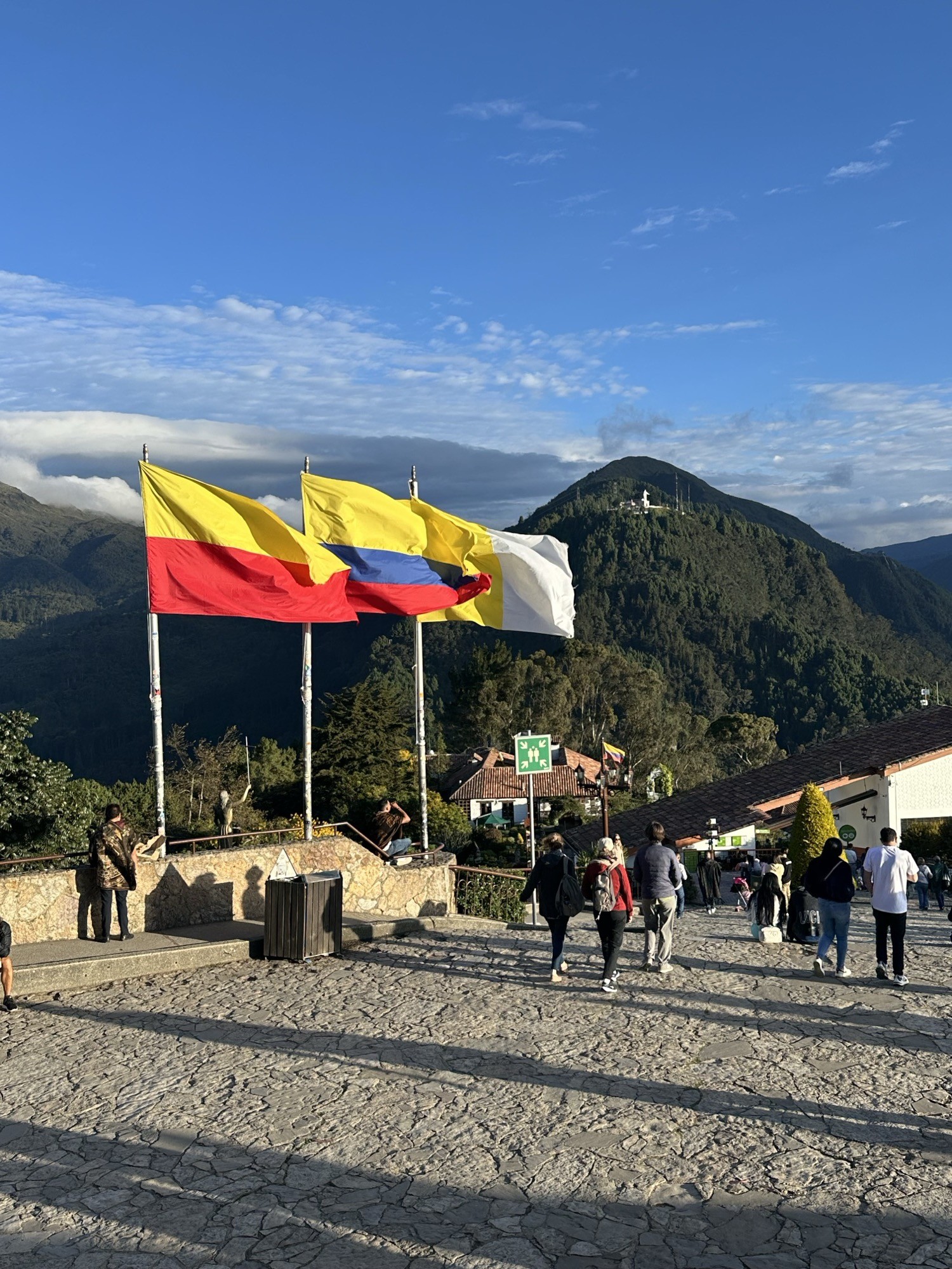 Colombian flags flying over the mountains