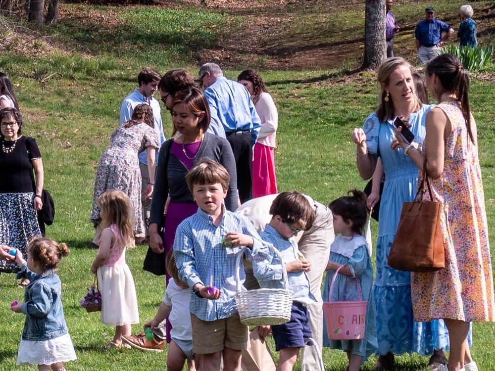 Children gather eggs at Easter.