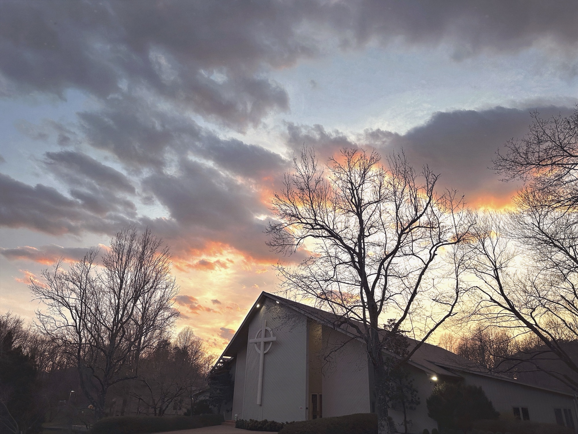 TPC front building with evening sky