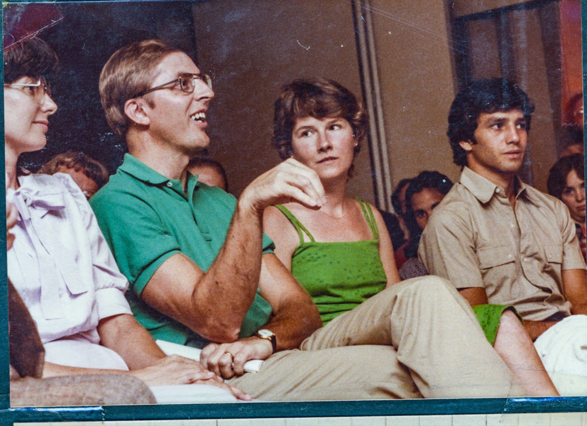 Ken Elzinga, seated at a Trinity gathering, early days